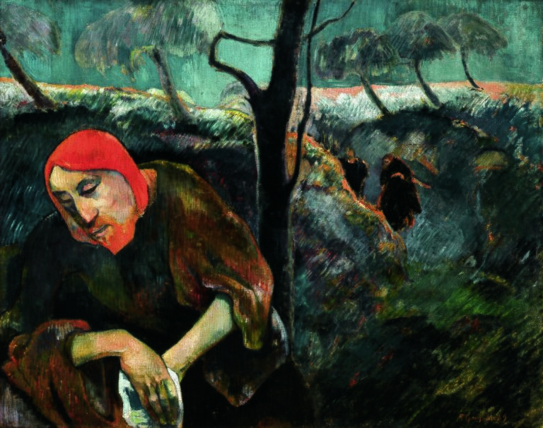 Christ appears in the foreground wearing a red cap and brown clothing, his face bowed in sorrow, while olive trees, rocky ground, and two distant figures occupy the dark landscape behind him.