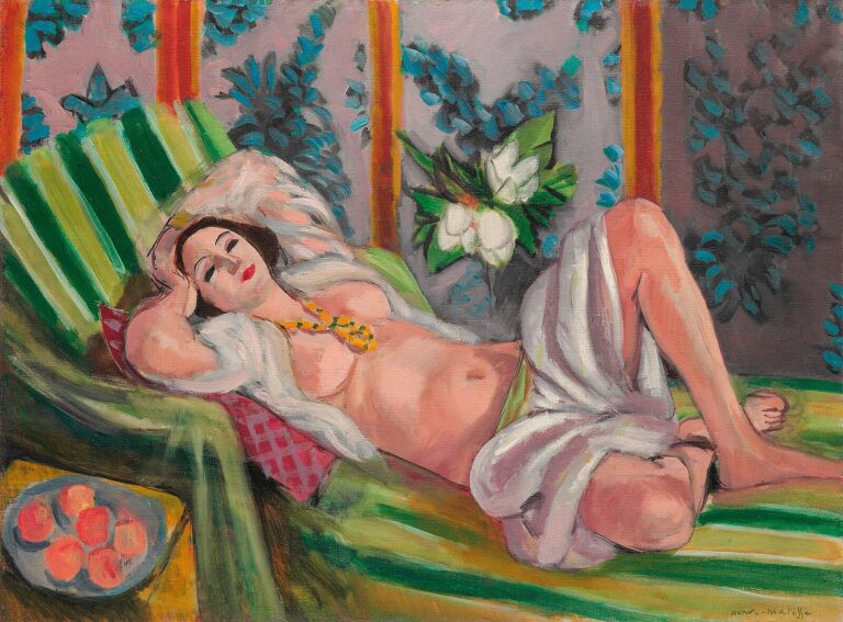 Henri Matisse’s Odalisque with Magnolias shows a reclining nude woman on a green-striped divan, partially wrapped in white fabric and wearing a yellow necklace, with a violet-blue patterned background, white magnolia blossoms, and a small plate of red-orange fruit nearby.
